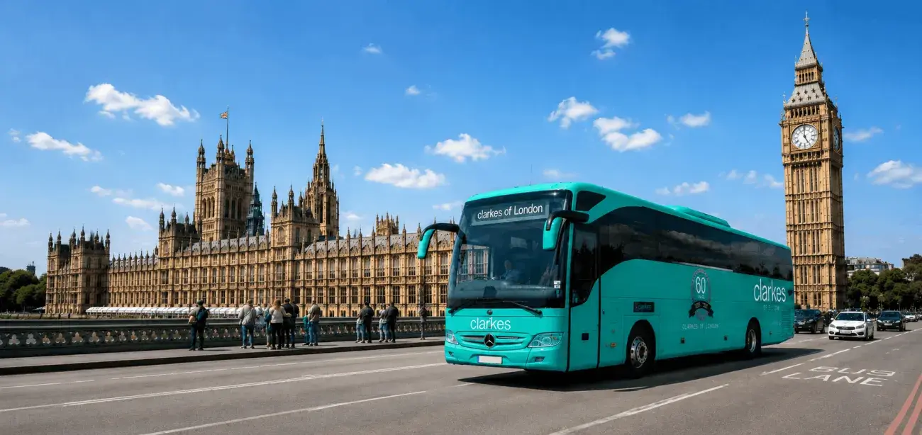 London Coaches by Clarkes of London passing Westminster and Big Ben