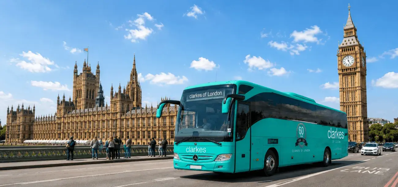 London Coaches by Clarkes of London passing Westminster and Big Ben