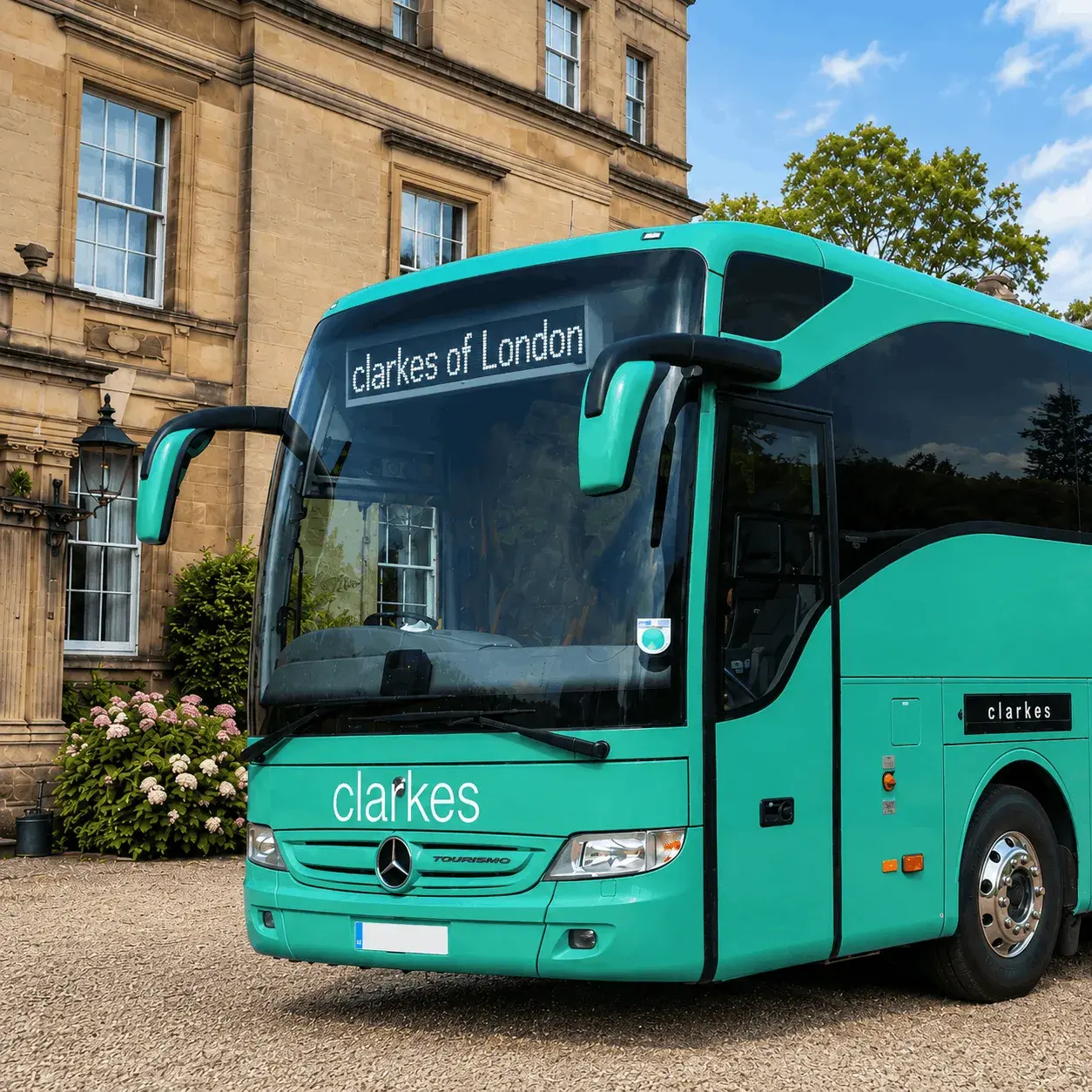 Luxury Clarkes of London Coach outside stately home