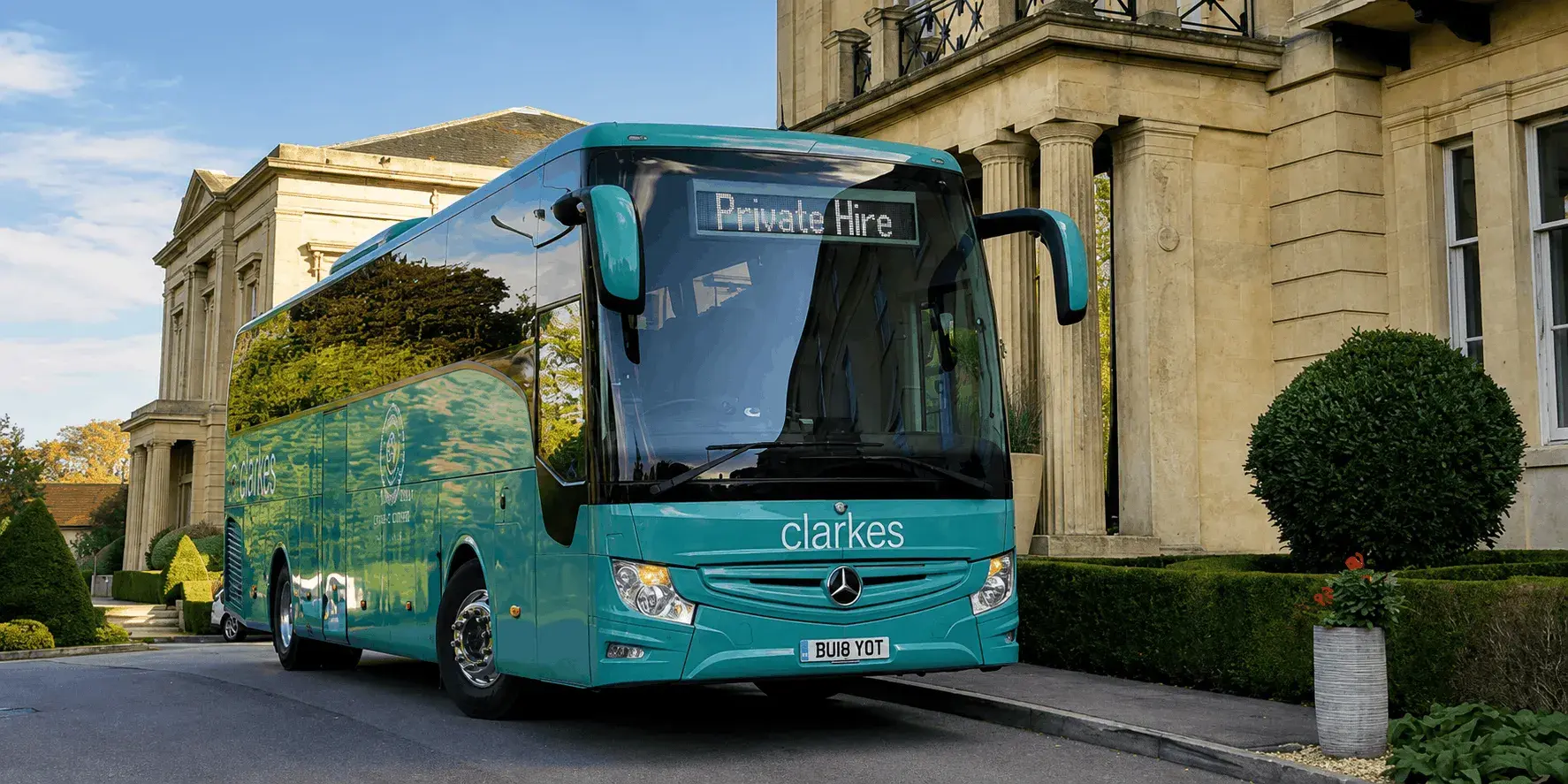 Clarkes of London Coach shuttle service outside stately home